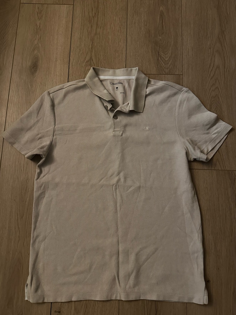 Calvin Klein Light Beige Polo Shirt with Subtle CK Logo